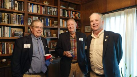 group of 3 older men posing