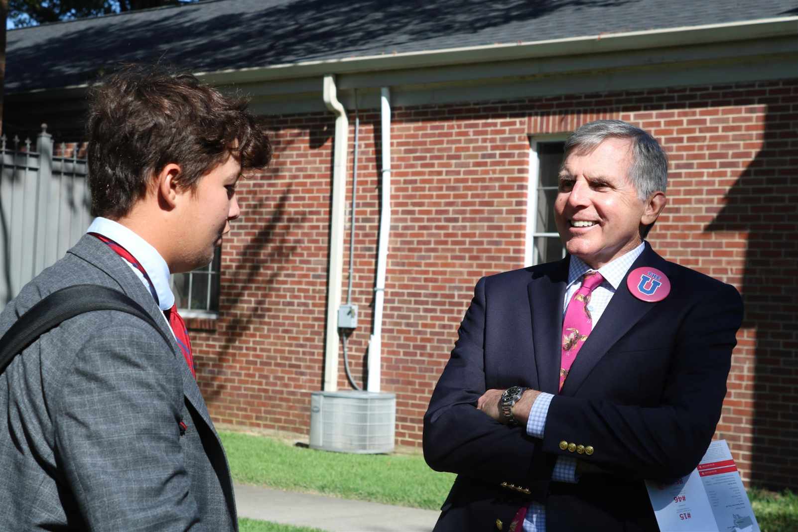 Teacher and student having a conversation.