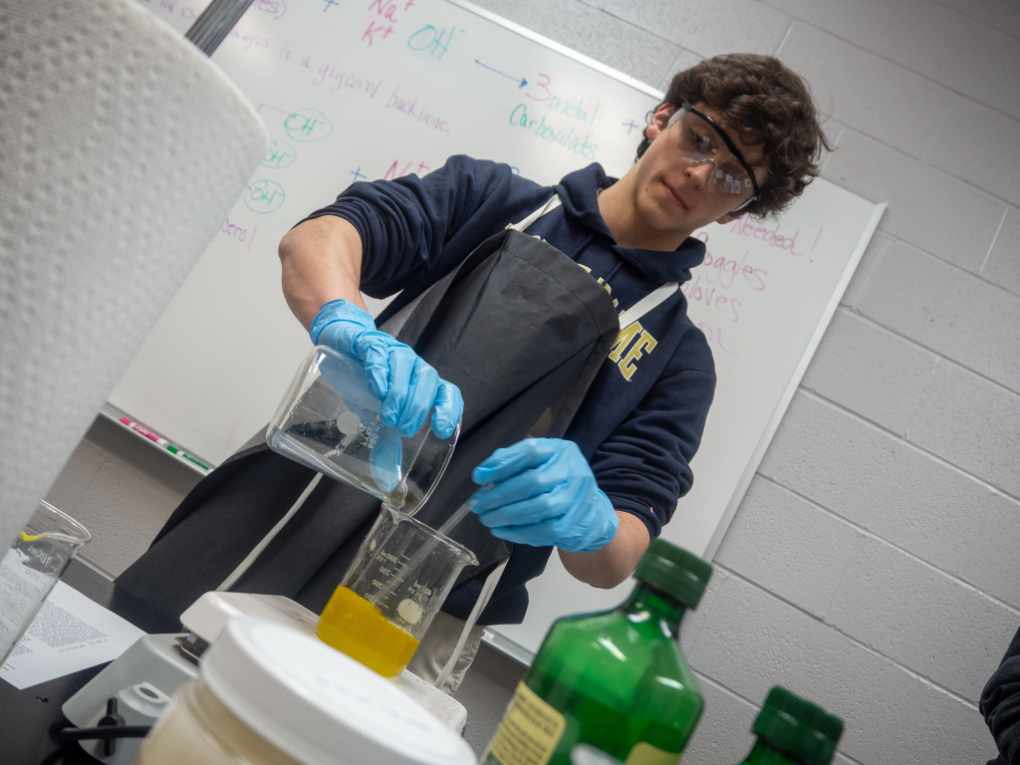 MUS upper school student in science class.