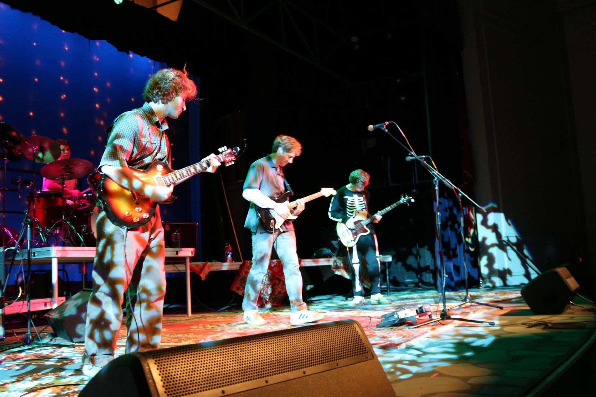 Group of student performing on stage.