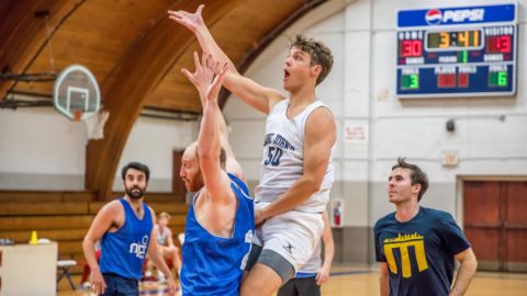 Alumni playing basketball 27