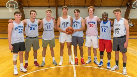 Alumni playing basketball 15