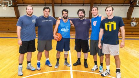 Alumni playing basketball 11
