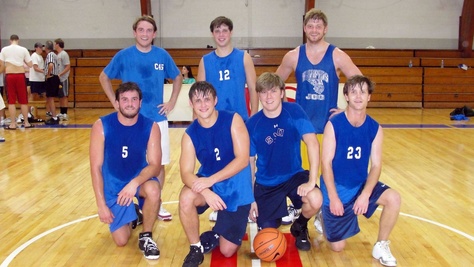 Alumni playing basketball 19