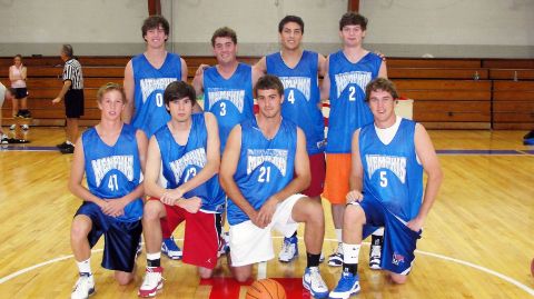 Alumni playing basketball 7