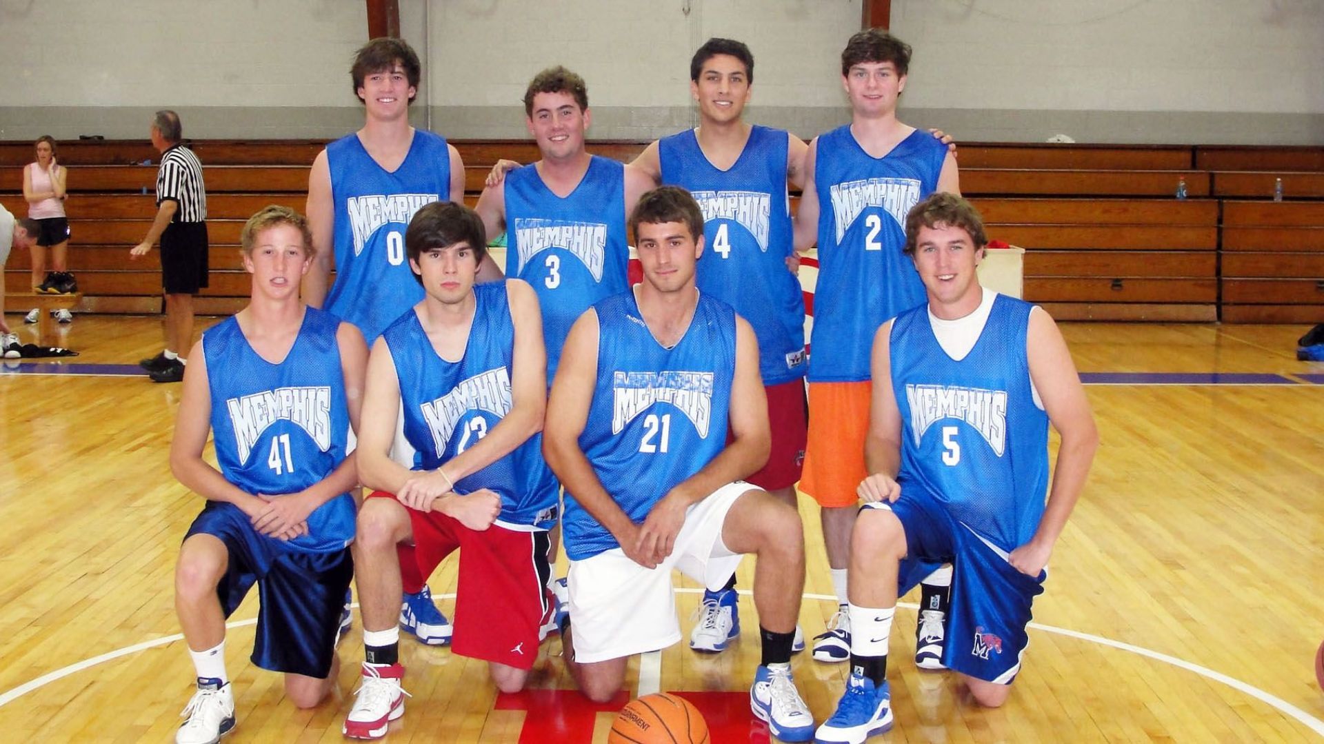 Alumni playing basketball 7