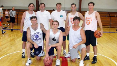 Alumni playing basketball 8