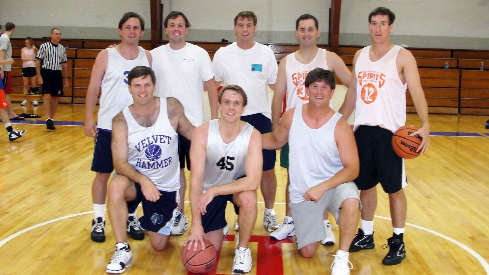 Alumni playing basketball 8