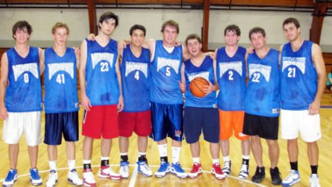 Alumni playing basketball 23