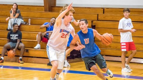 Alumni playing basketball 24