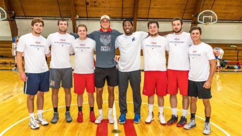 Alumni playing basketball 22
