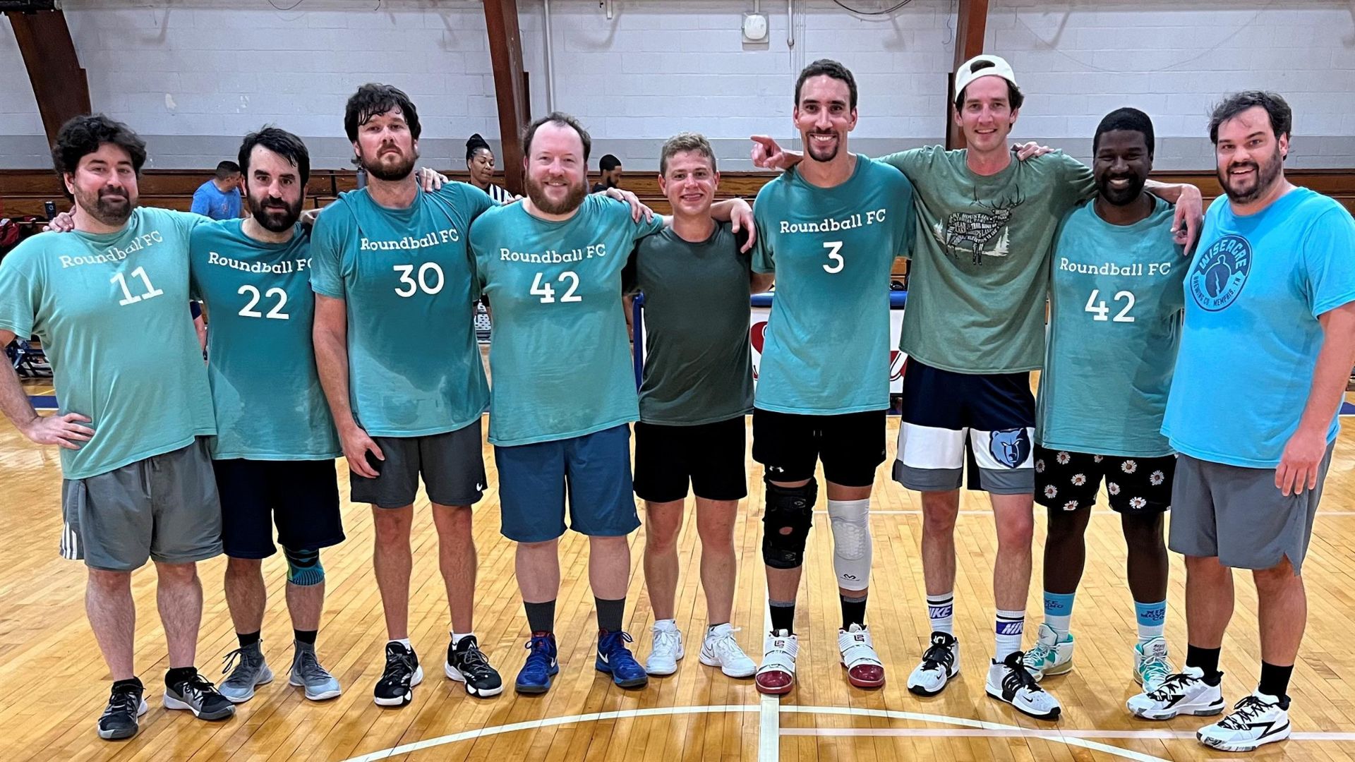 Alumni playing basketball 9