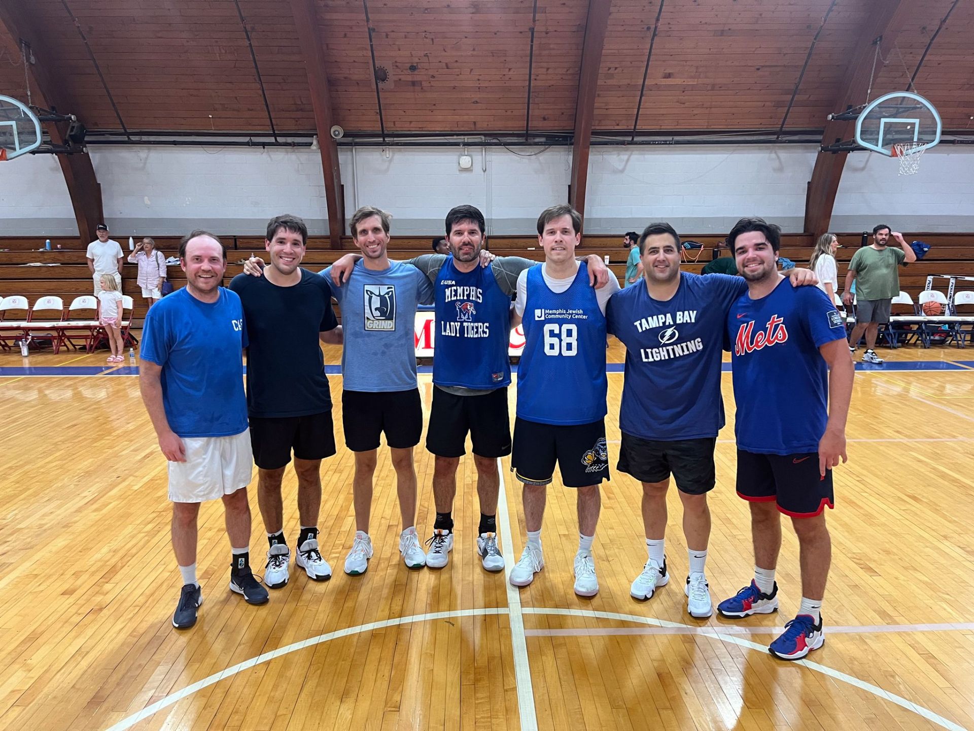 Alumni playing basketball 1