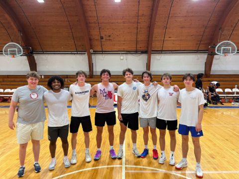 Alumni playing basketball 18