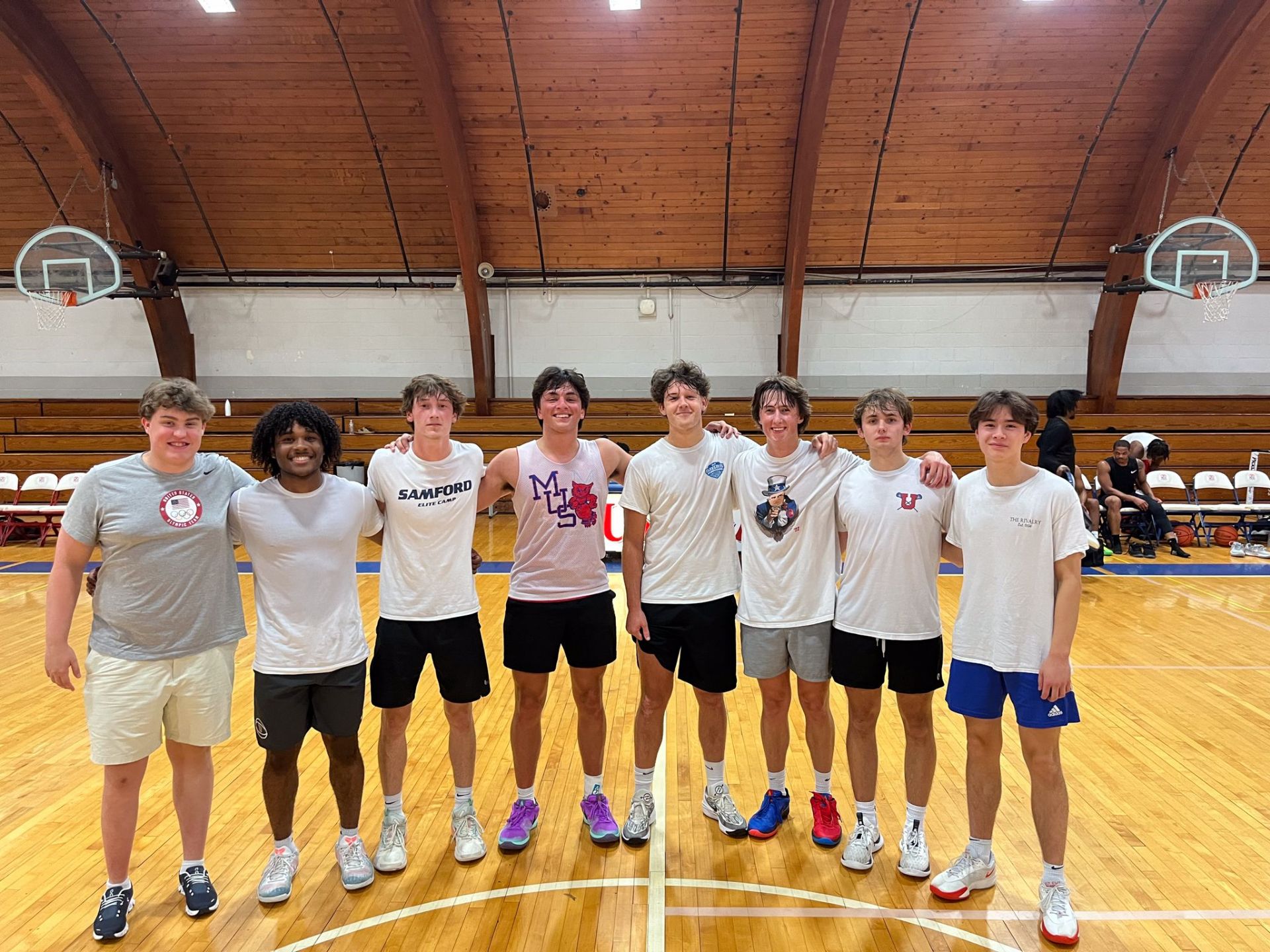 Alumni playing basketball 18