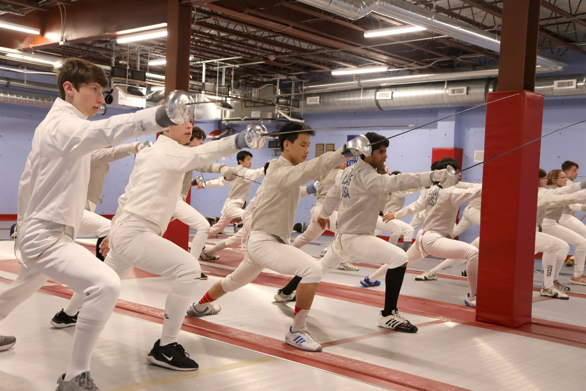Fencing team at practice.